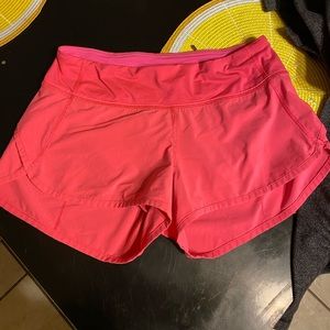 Pink lululemon speed shorts
